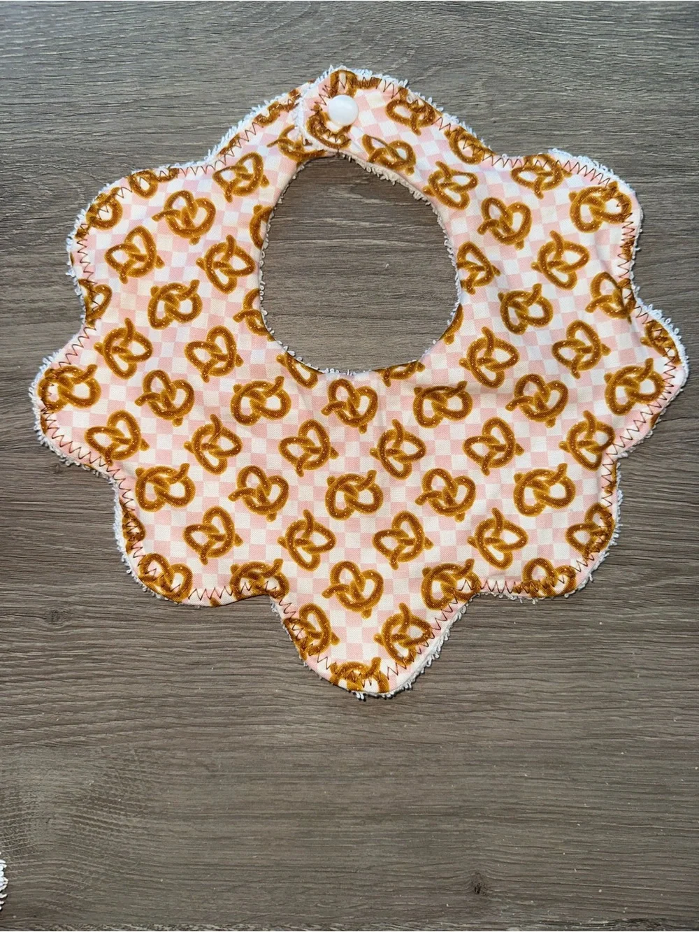 Pink & Brown Pretzel Pattern Flower Baby Bib